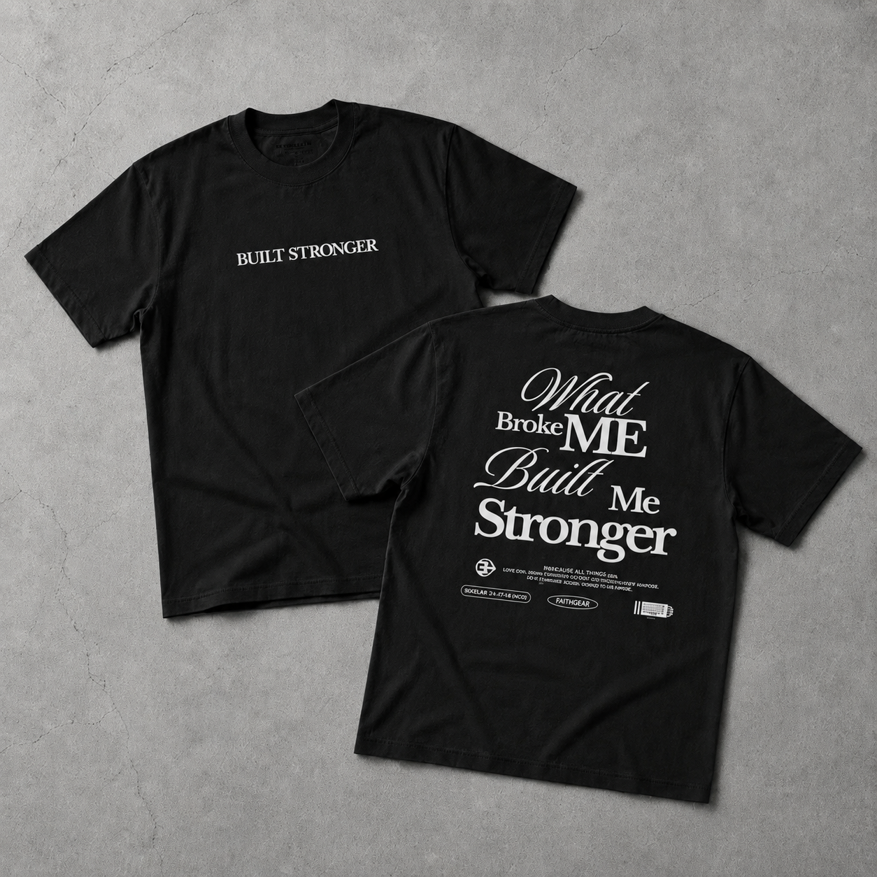 Black t-shirt with motivational text on a gray surface